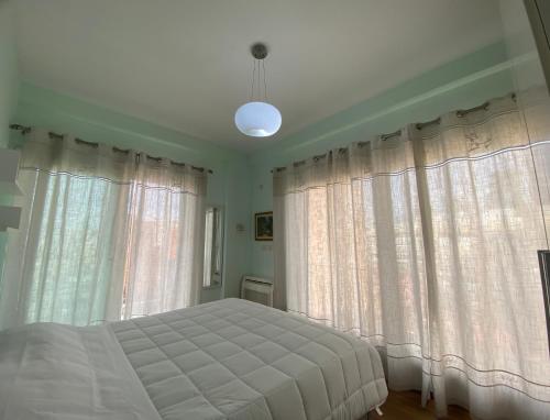 Ένα ή περισσότερα κρεβάτια σε δωμάτιο στο Valeur Penthouse Tirana City Center