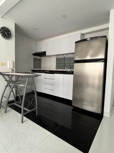 Kuchyň nebo kuchyňský kout v ubytování Apartamento de descanso Peñalisa Ricaurte