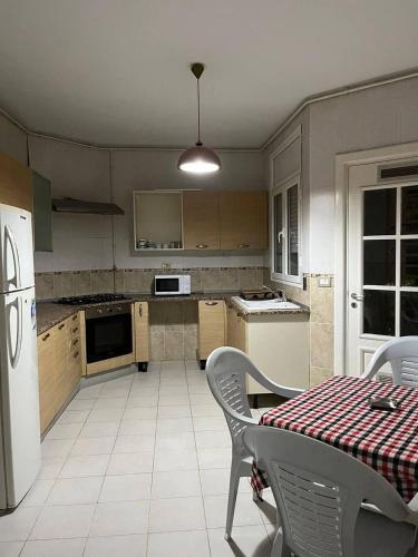Kuchyň nebo kuchyňský kout v ubytování carfort House