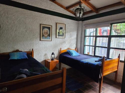 Postel nebo postele na pokoji v ubytování Hacienda Gonzabal
