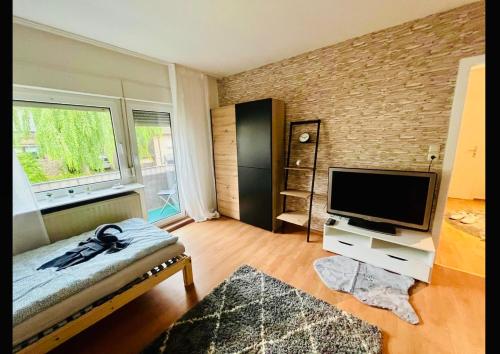 Televisyen dan/atau pusat hiburan di PF Apartments D2