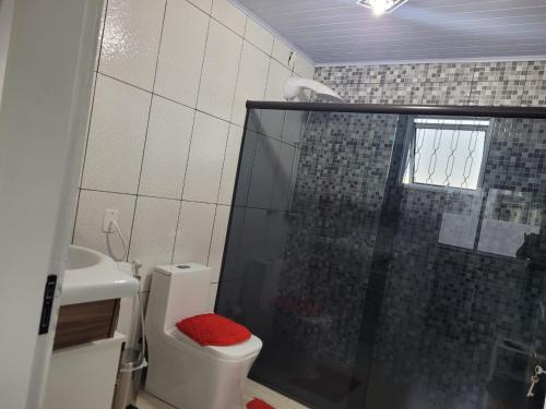 Et badeværelse på Casa próxima ao Centro