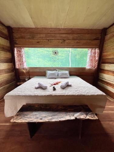 Cama o camas de una habitación en PuraChata Ecolodge