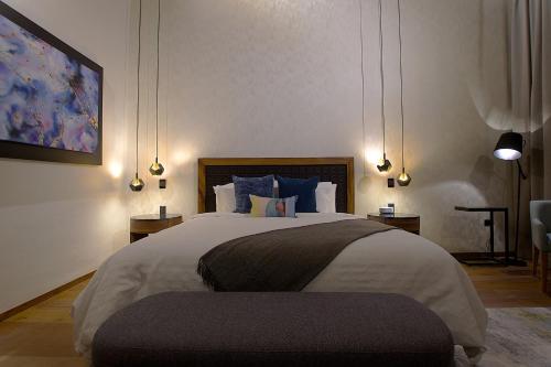 Ένα ή περισσότερα κρεβάτια σε δωμάτιο στο Nueve 25 Hotel Boutique