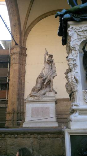 a statue on the side of a building at Albergo Ristorante La Greppia in Montedivalli Chiesa