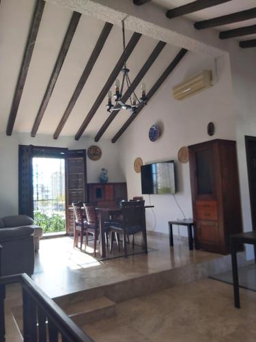 Televisyen dan/atau pusat hiburan di Andalusian Beach House