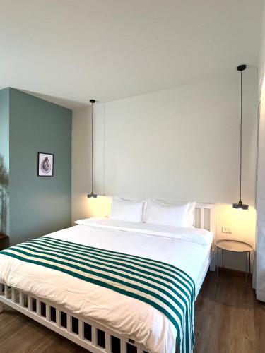 Katil atau katil-katil dalam bilik di Nautical Home & Seashell House B&B