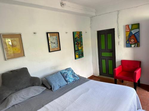 Ліжко або ліжка в номері Hostal Chirrín
