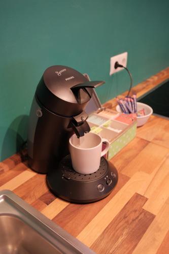 a coffee maker sitting on top of a counter at Altes Höfchen in Duisburg