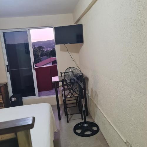 Paradise place grande view roomにあるテレビまたはエンターテインメントセンター