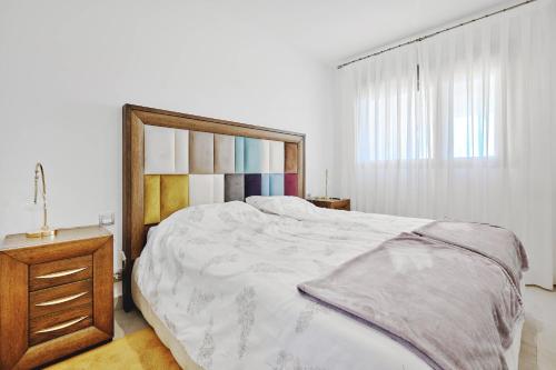 En eller flere senge i et værelse på Casa Pedro