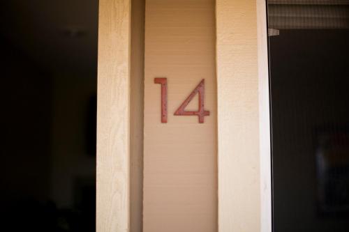 a door with the number forty four on it at Cambria Shores Inn in Cambria