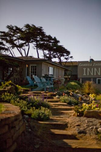 a house with a garden in front of it at Cambria Shores Inn in Cambria