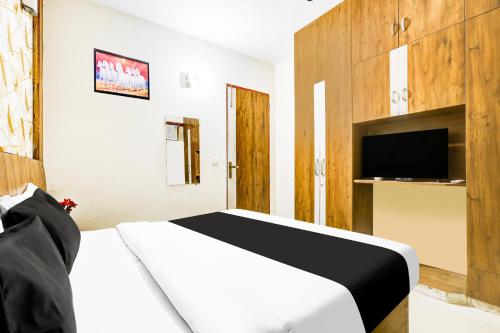 TV a/nebo společenská místnost v ubytování Super Hotel O Sector 52 Gurgaon