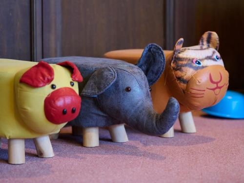 a toy elephant and a pig and a cow at Ikaho no mori Kids Paradise in Ikaho