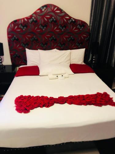 Postel nebo postele na pokoji v ubytování Lodge Bellagio