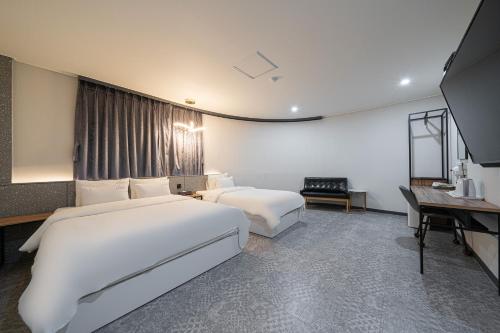 Katil atau katil-katil dalam bilik di Hotel Lion