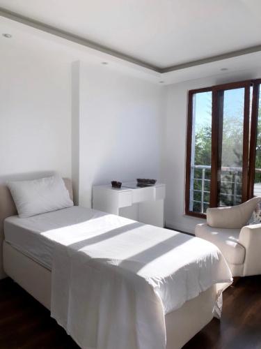 Letto o letti in una camera di Wonderful Villa Airport 5 minutes