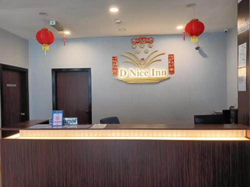 a sign that says dineeln in a waiting room at Hotel O D Nice Inn Hotel in Kuala Lumpur