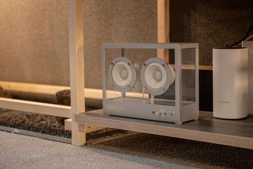a speaker sitting on a shelf in a room at Mi-Kan Design Hotel in Tokyo