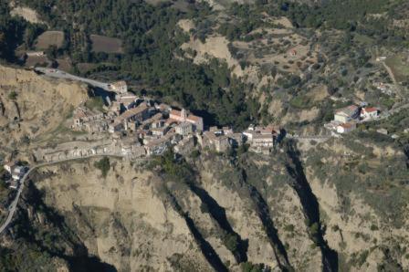 a village on the side of a mountain at Palazzo dei Poeti in Tursi