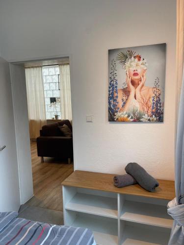 a room with a picture of a woman on the wall at Unique loft for 8 in Eggenstein-Leopoldshafen