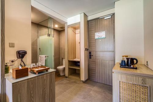 Koupelna v ubytování Sima Hotel Kuta Lombok