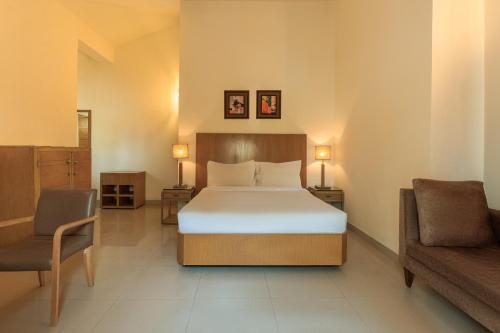 Postel nebo postele na pokoji v ubytování Villas By Hangout