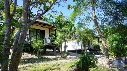 a house in the middle of a forest at TinyHouse at TigerCave in Ko Bu Bu