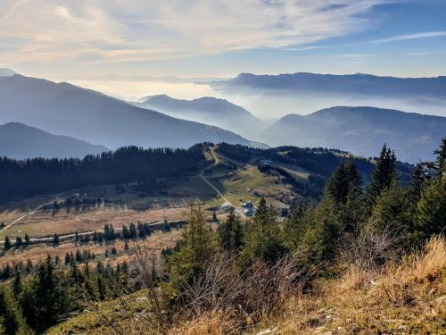 a view of a valley with mountains in the distance at Plein Ciel sur les pistes 40m2 - 2 chambres in Allevard