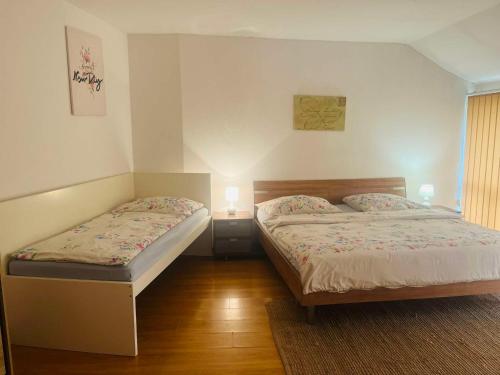 Postel nebo postele na pokoji v ubytování Apartmán U Slunečnice