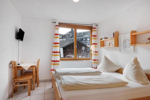 Ένα ή περισσότερα κρεβάτια σε δωμάτιο στο Residenz Am See - Fewo 1 und Fewo 3