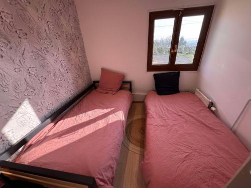 Cama o camas de una habitación en Gîte Epis du Moulin