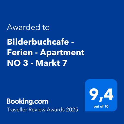 a blue sign with the words awarded to bibliographygraduate eighteen appointment no market at Das BilderbuchCafe - Ferien - Apartment NO 3 - Markt 7 in Havelberg