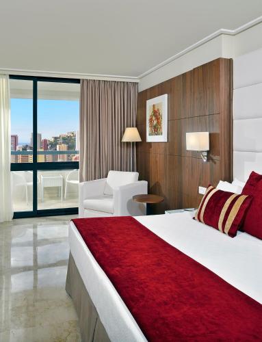 Ένα ή περισσότερα κρεβάτια σε δωμάτιο στο Melia Benidorm