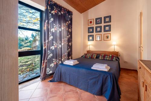 Postel nebo postele na pokoji v ubytování Sweet Tuscany