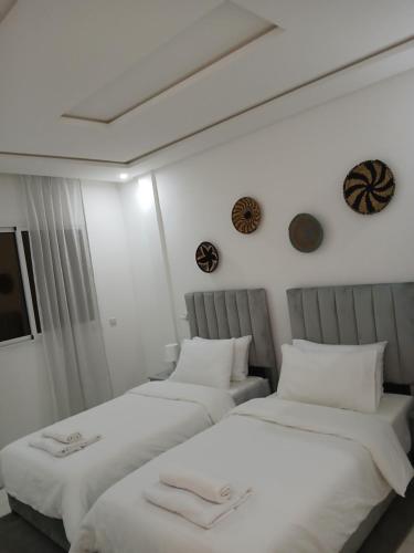 Ein Bett oder Betten in einem Zimmer der Unterkunft Perla House