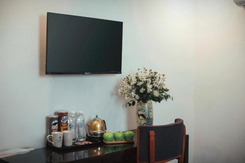 Central Sapa March Hotelにあるテレビまたはエンターテインメントセンター