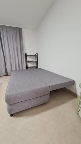 Postel nebo postele na pokoji v ubytování Gästehaus Ferienwohnung Zimmer 2C oder Zimmer 2D Jülich