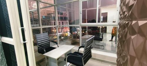 Posezení v ubytování Hotel Vaishnavi Grand