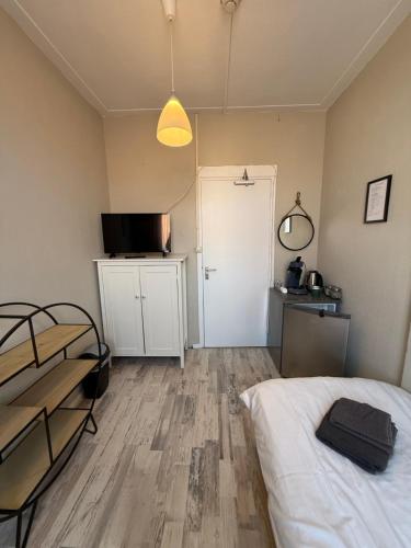 Postel nebo postele na pokoji v ubytování Blankebil Rooms