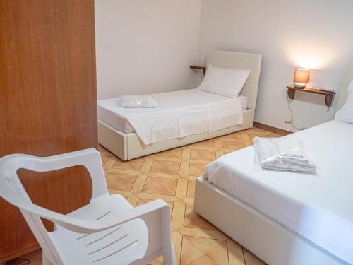Postel nebo postele na pokoji v ubytování Villa Cordella 5