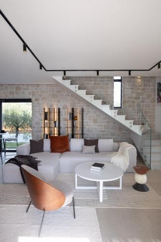 Ruang duduk di Casa Muso Luxury Villa