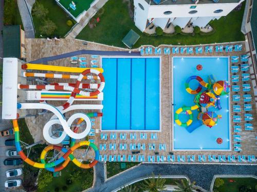 an overhead view of a resort swimming pool at Asteria Collection Side in Side