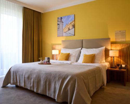 Posteľ alebo postele v izbe v ubytovaní Henriette Stadthotel Vienna