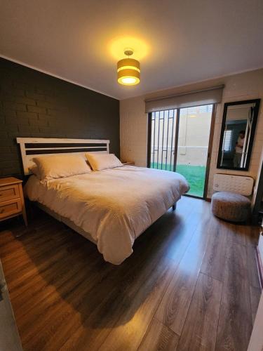 Кровать или кровати в номере casa cielos del valle