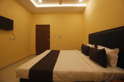Katil atau katil-katil dalam bilik di Hotel Mint Park