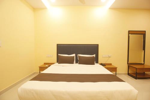 Katil atau katil-katil dalam bilik di Hotel Mint Park