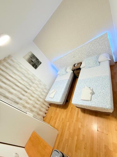 Katil atau katil-katil dalam bilik di Hostal Quinta Santillan