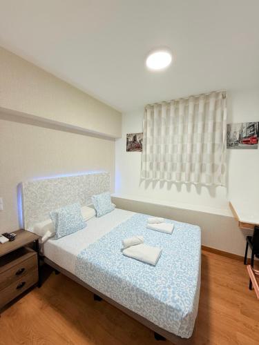 Katil atau katil-katil dalam bilik di Hostal Quinta Santillan